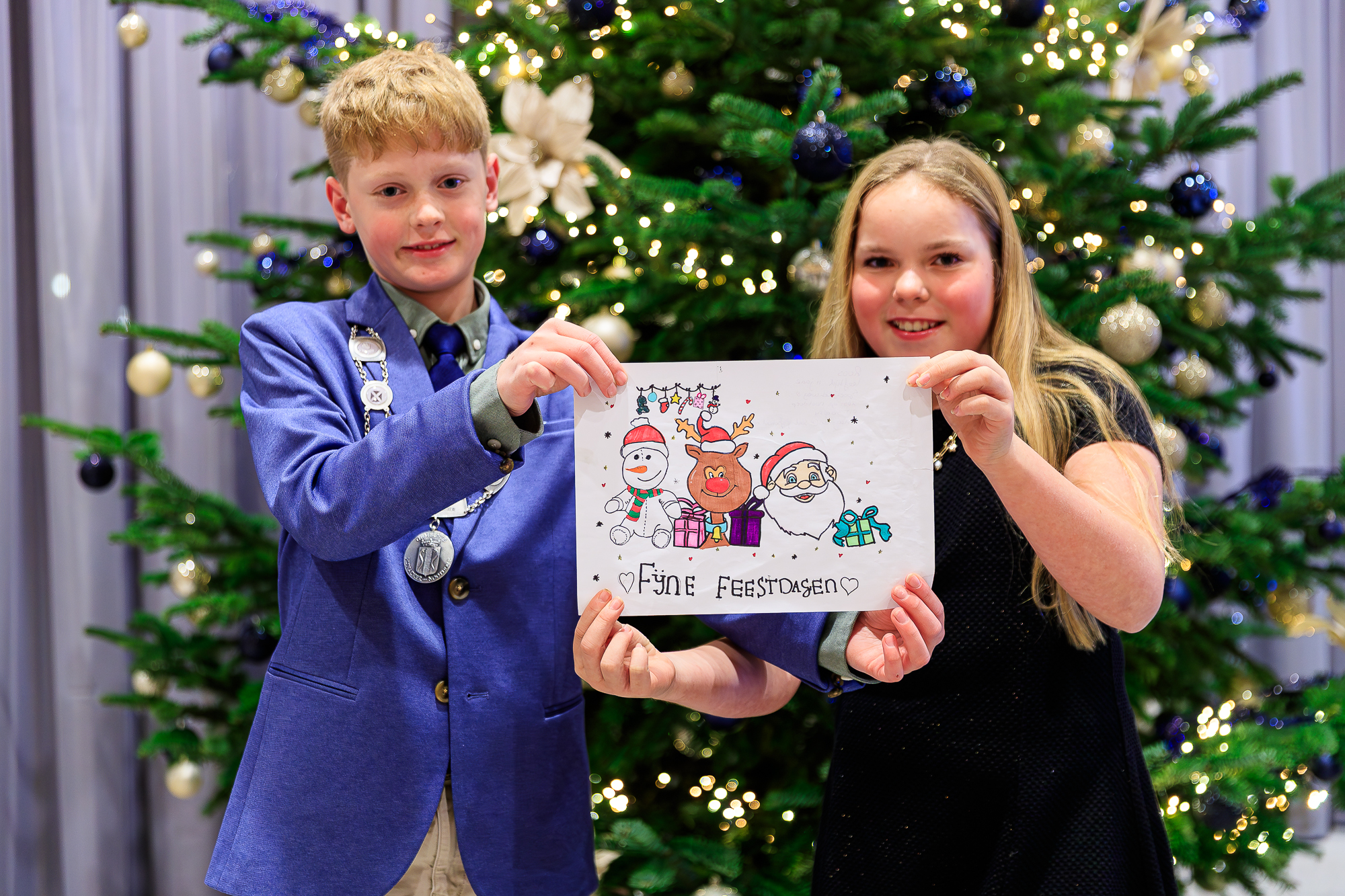 Roos winnaar tekenwedstrijd kerstkaart gemeente